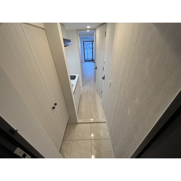 レジュールアッシュ塚本レジデンス8階1K 玄関の画像