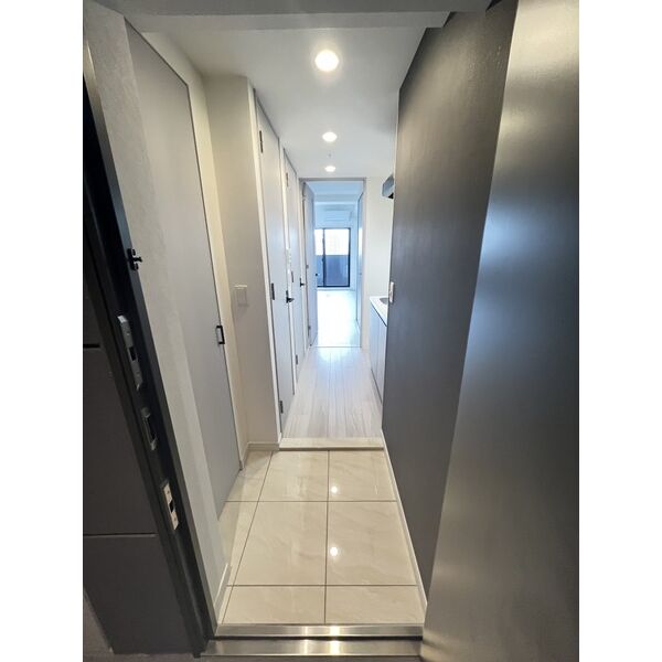 レジュールアッシュ塚本レジデンス9階1K 玄関の画像