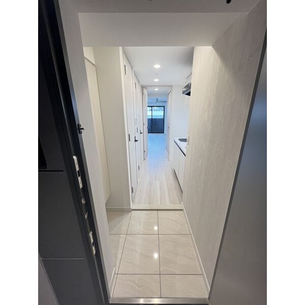 レジュールアッシュ塚本レジデンス5階1K 玄関の画像