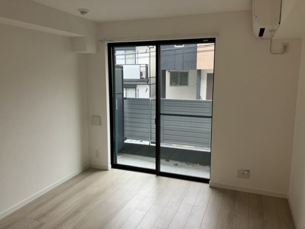 プルメリア阪大前1階1K リビングの画像