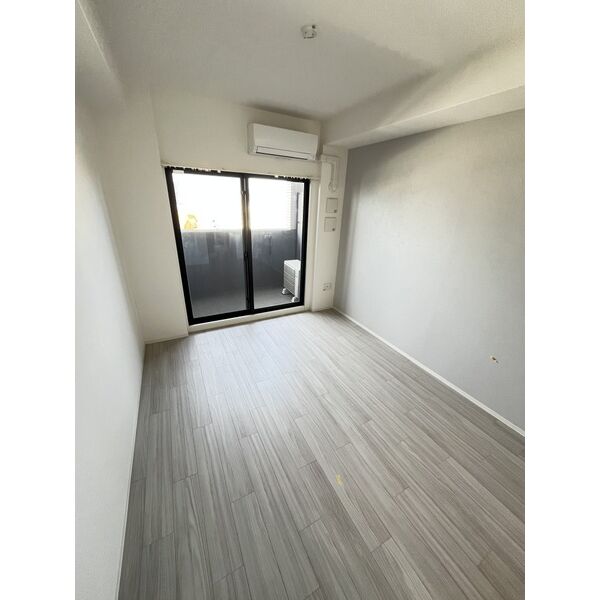 レジュールアッシュ塚本レジデンス9階1K リビングの画像