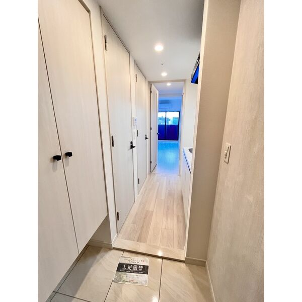 レジュールアッシュ塚本レジデンス10階1K 玄関の画像