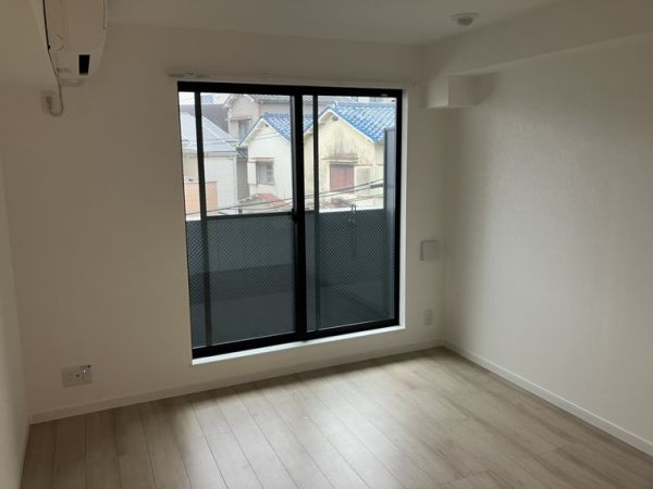 プルメリア阪大前2階1K リビングの画像