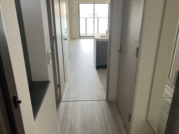 ブランシエスタ南吹田パークサイド10階1LDK 玄関の画像